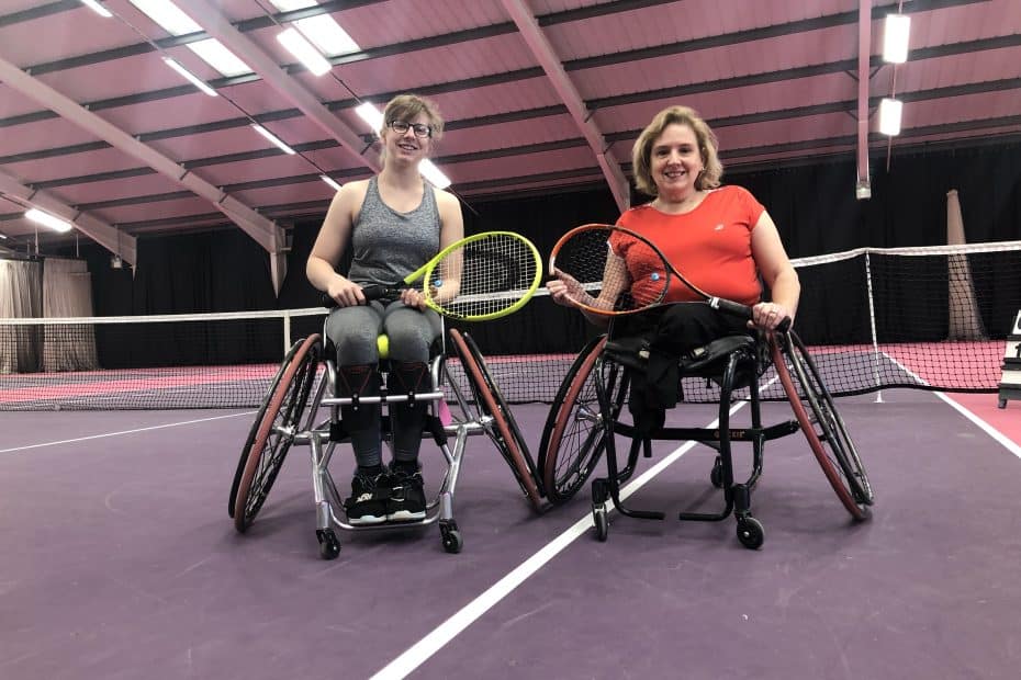 Tracey Proudlock and Abbie Breakwell on a tennis court holding tennis rackets